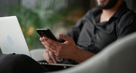 Man looking at his phone screen