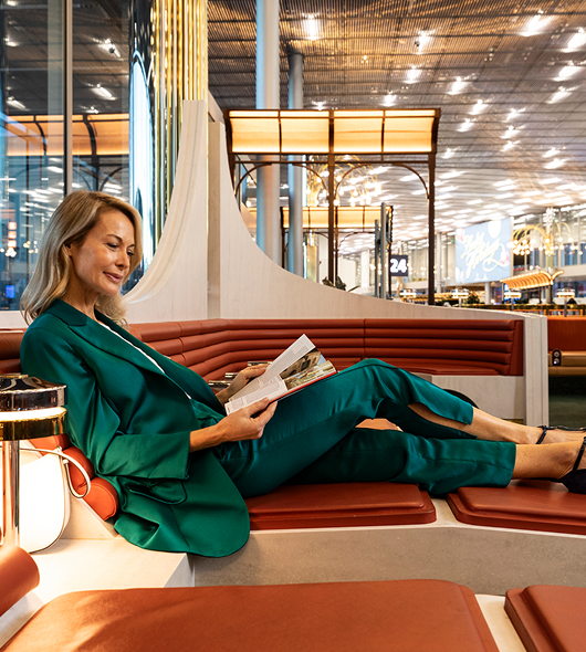 Passenger in the Extime Terminal 1 boarding lounge, Paris-Charles de Gaulle